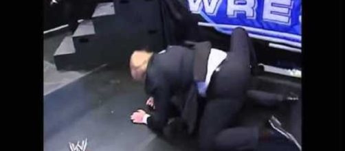 Trump wrestles McMahon in staged fight. Photo via flickx.ws, YouTube.