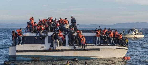 Syrian and Iraqi immigrants getting off a boat from Turkey. Image credit CGIA Wikimedia Syrian and Iraqi immigrants getting off a boat from Turkey. Image credit CGIA Wikimedia