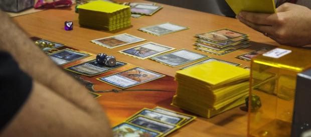 A game of magic Commander / EDH (via wikimedia commons - Tourtefouille) A game of magic Commander / EDH (via wikimedia commons - Tourtefouille)