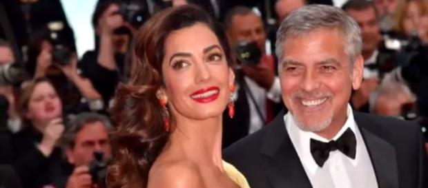 George Clooney threatens prosecution over photos of twins - CBS News/YouTube George Clooney threatens prosecution over photos of twins - CBS News/YouTube