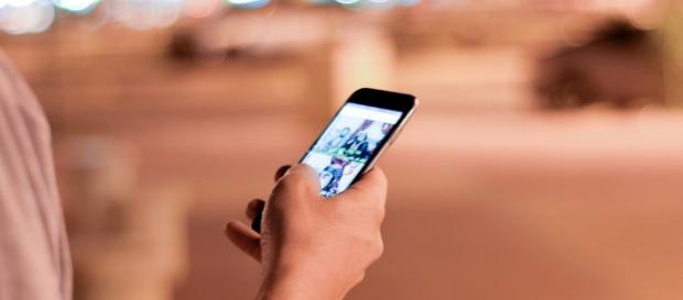 You can be fined for staring at your mobile device while crossing the street / Photo via Hamza Butt, Flickr You can be fined for staring at your mobile device while crossing the street / Photo via Hamza Butt, Flickr