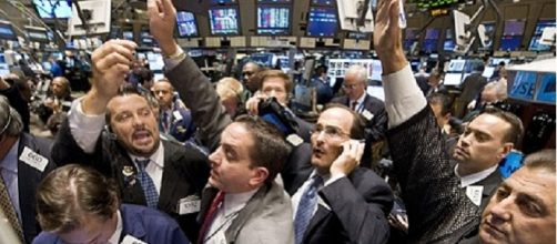 New York Stock Exchange trading floor credits:flickr https://www.flickr.com/photos/83532250@N06/7651028854