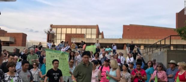 Univ. of Illinois kidnapper was at rally for victim. Note man in black on upper right. / from 'CNN' - cnn.com Univ. of Illinois kidnapper was at rally for victim. Note man in black on upper right. / from 'CNN' - cnn.com