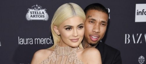 The "KUWTK" star reminds everyone that she's over Tyga by doing something permanent. (via Blasting News library)
