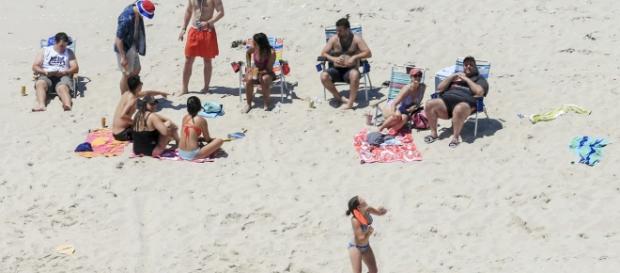 Christie lounges on NJ beach with family after closing it to all other residents. Christie lounges on NJ beach with family after closing it to all other residents.