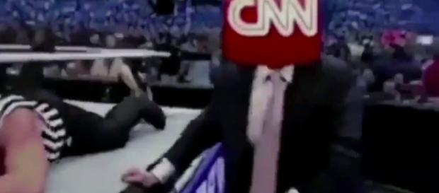 Trump's fake wrestling video which showed the billionaire slam CNN. Photo via Mitchell Wiggs, YouTube. Trump's fake wrestling video which showed the billionaire slam CNN. Photo via Mitchell Wiggs, YouTube.