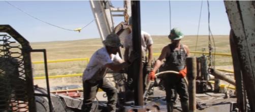 Drilling Rig Pipe Connection - gas prices drop in the USA - Image credit Calculated risk films | Youtube