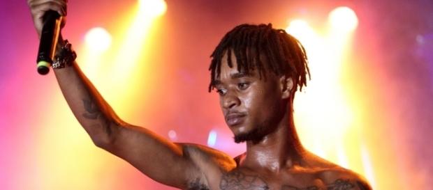 Slim Jxmmi durante un concierto (Vía: xxlmag.com) Slim Jxmmi durante un concierto (Vía: xxlmag.com)