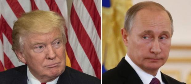 Trump and Putin at their first face-to-face meeting. Trump and Putin at their first face-to-face meeting.
