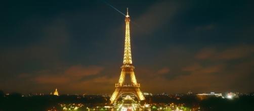Eiffel Tower illuminating the night sky in Paris, France. - tpsdave via pixabay