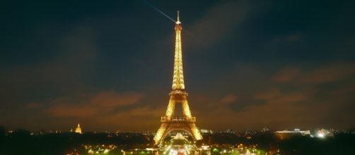 Eiffel Tower illuminating the night sky in Paris, France. - tpsdave via pixabay