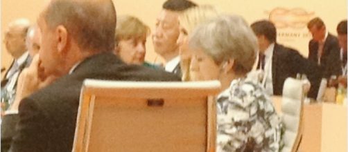Ivanka is seated between Xi Jinping and Theresa May at G20 meeting. Photo via Svetlana Lukash, Twitter.