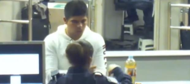 A still showing Cruz Velazquez Acevedo talking with one of the officers who asked him to drink from the bottle. - YouTube/IRATE Productions A still showing Cruz Velazquez Acevedo talking with one of the officers who asked him to drink from the bottle. - YouTube/IRATE Productions