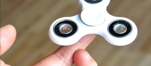 Fidget spinners have been a calming and fun companion for its owners, at least until now. (via Talltanic/Youtube)