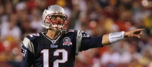 Photo of Cover star of Madden 18 Tom Brady by Keith Allison via Flickr. Photo of Cover star of Madden 18 Tom Brady by Keith Allison via Flickr.