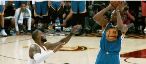 LeBron James and the Cavs visit Kevin Durant and the Warriors for a Christmas Day showdown. [Image via NBA/YouTube]