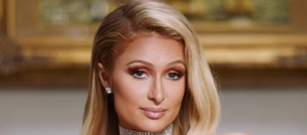 Paris Hilton defends Donald Trump against sexual assault accusers/Photo via W Magazine, YouTube Paris Hilton defends Donald Trump against sexual assault accusers/Photo via W Magazine, YouTube