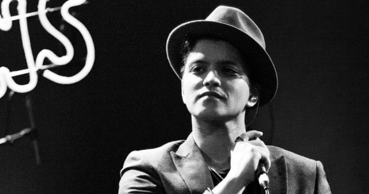 Bruno Mars debuts new ‘Versace On The Floor’ music video, serenades Zendaya