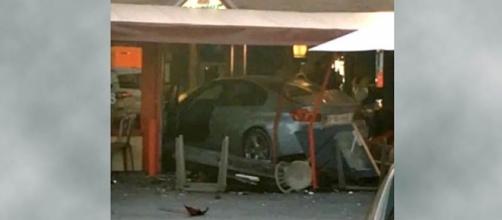 A driver crashed his BMW into a pizzeria in France killing one and injuring 13 [Image: YouTube/ Right Side Broadcasting Network]