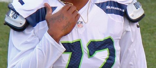 Michael Bennett is maintaing a national anthem protest. Jeffrey Beall via Wikimedia Commons