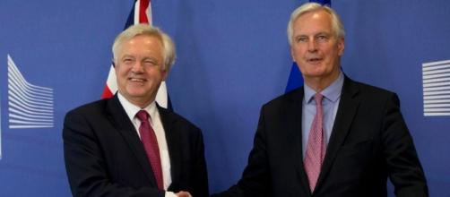 David Davis and Michel Barnier shake hands as Brexit talks finally ... - thesun.co.uk