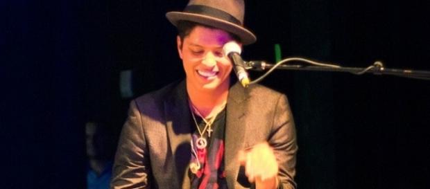 Bruno Mars performs during a concert in Houston (Brothers Le/Flickr). Bruno Mars performs during a concert in Houston (Brothers Le/Flickr).