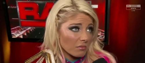 Alexa Bliss got touched inappropriately by a young fan at a live show, although it could have been accidental. [Image via WWE/YouTube]