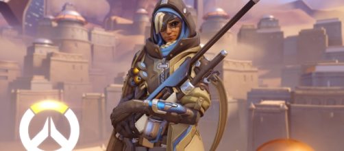 Ana is capable of healing her teammates while damaging her opponents at the same time (via YouTube/PlayOverwatch)