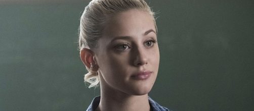 Lili Reinhart admits that there's a certain "darkness" that will "envelop" Betty when the show returns this October. (The CW)