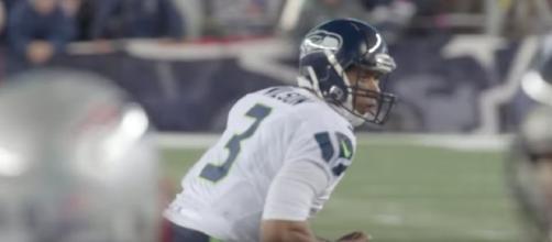 Russell Wilson and the Seahawks host the Chiefs in an NFL preseason game on Friday night. [Image via NFL/YouTube]