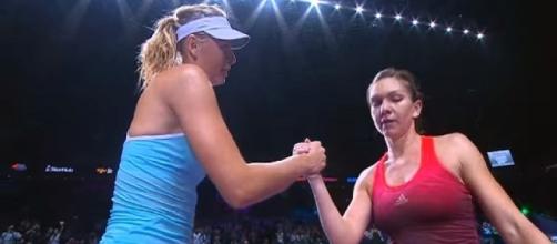 Sharapova and Halep during 2015 WTA Finals in Singapore/ Photo: screenshot via WTA official channel on YouTube