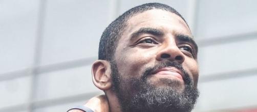 Kyrie Irving receives support from Udonis Haslem. (Image credit: Erik Drost/WikiCommons)