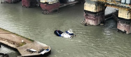 Coast Guardsmen rescue 15 people in distress aboard three vessels after Hurricane Harvey made landfall near - department of defence