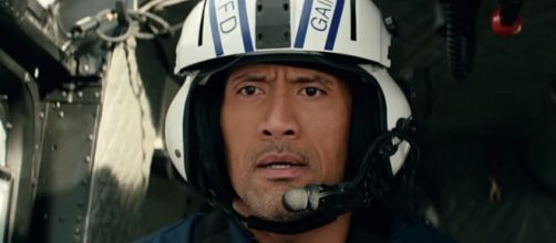 Dwayne "The Rock" Johnson's character in "San Andreas" inspired a boy to save his brother's life [Image: YouTube' Warner Bros. Pictures]