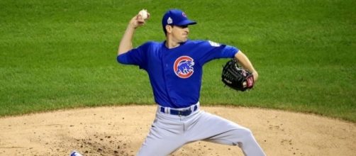 Hendricks is ready to throw, https://en.wikipedia.org/wiki/Kyle_Hendricks#/media/File:Kyle_Hendricks_first_inning_Game_7_2016_World_Series.jpg