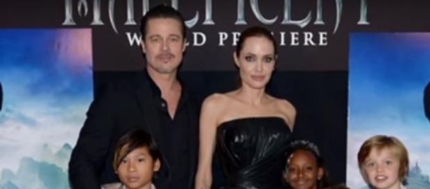 Angelina Jolie and Brad Pitt are reportedly getting back together for their kids. Photo by Entertainment Weekly/YouTube Screenshot Angelina Jolie and Brad Pitt are reportedly getting back together for their kids. Photo by Entertainment Weekly/YouTube Screenshot