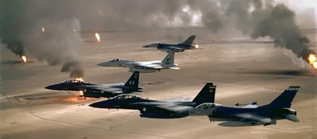 F-15 and F-16 flying over Kuwaiti oil fires during the Gulf War in 1991//wikipedia F-15 and F-16 flying over Kuwaiti oil fires during the Gulf War in 1991//wikipedia
