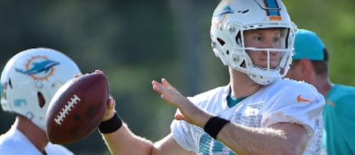 Ryan Tannehill injured in Dolphins training camp - (Image credit: YouTube|ESPN)