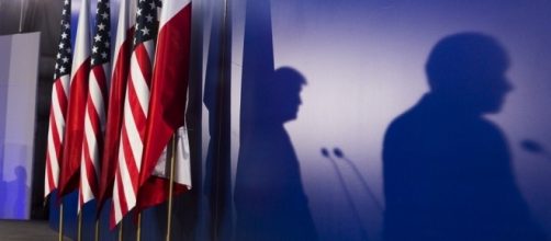 President Trump's shadow while in Poland, July 2017 / [Image by The White House via Flickr, Public Domain]