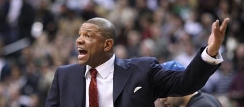 Doc Rivers will still earn his salary of over $10 million this season for his two roles -- Keith Allison via WikiCommons