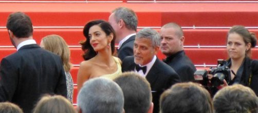 A photo showing George and Amal Clooney at the 2016 Cannes Film Festival - Flickr/GabboT