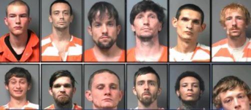 A photo showing the 12 Alabama inmates who were able to escape using peanut butter - YouTube/NBC News