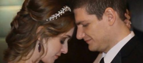 Neely and Andrew Moldovan photographed during their wedding - YouTube/102 News