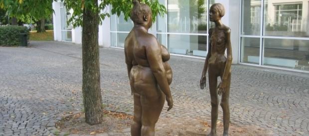 Overweight vs skinny sculpture via Wikimedia Commons Overweight vs skinny sculpture via Wikimedia Commons