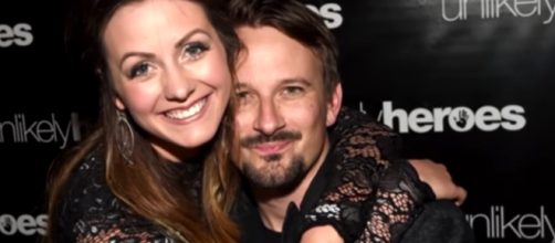 Carly Waddell and Evan Bass are expecting their first baby. Image via YouTube/ET