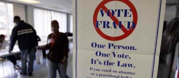 Sign warning against voter fraud. (YouTube snipped) Sign warning against voter fraud. (YouTube snipped)