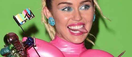 Miley Cyrus just announced her newest album "Younger Now." Image via YouTube/Hollyscoop