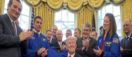 President Donald Trump with NASA personnel / Photo via NASA/Bill Ingalls , Wikimedia Commons