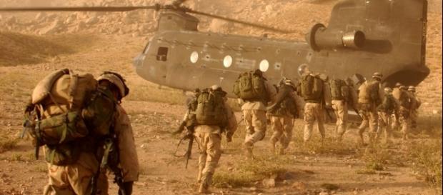 Soldiers march to the ramp of the CH-47 Chinook helicopter on Sept. 4, 2003 by Staff Sgt. Kyle Davis via Wikimedia Commons Soldiers march to the ramp of the CH-47 Chinook helicopter on Sept. 4, 2003 by Staff Sgt. Kyle Davis via Wikimedia Commons