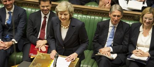 Theresa May exchanges a grin at leader of the Opposition Jeremy Corbyn - UK Parliament - Flickr
